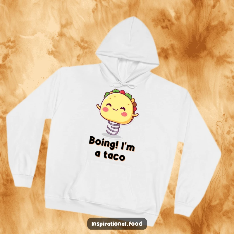 Funny hoodie showcasing a joyful taco character with a wide mouth, enthusiastically bouncing on a spring.