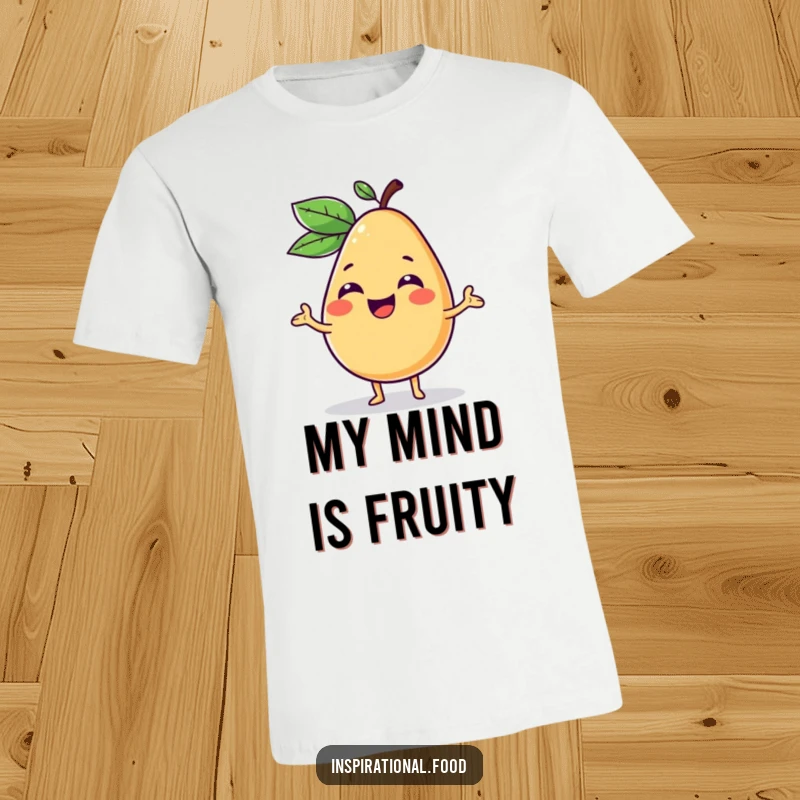 Funny t-shirt featuring a happy fruit character giggling while presenting a colorful, imaginative food concept, embodying innovation.