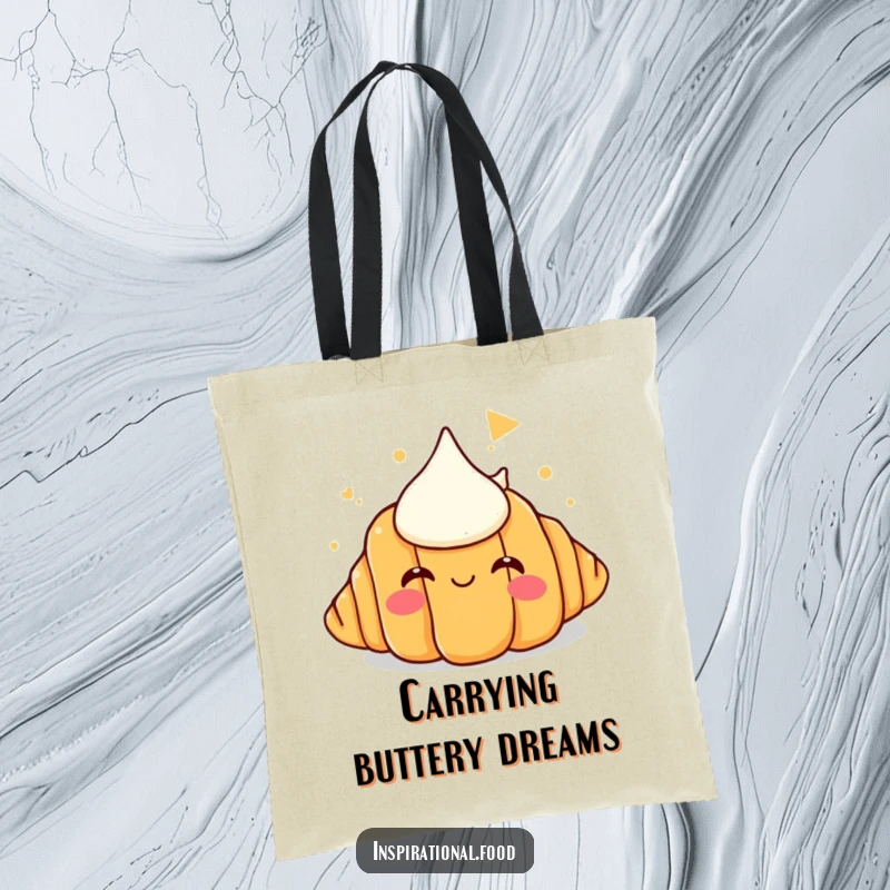 Funny tote bag with a smiling croissant intensely dreaming of a mountain of butter, showcasing its delicious aspirations humorously.